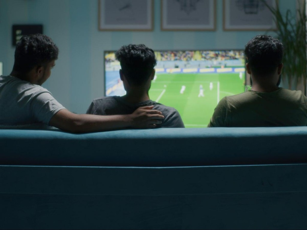 Friends watching TV together